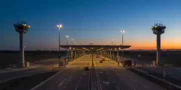 Advanced border control technology at dusk, showing surveillance and secure infrastructure