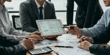 Small business owners discussing 2026 tax deductions and financial planning